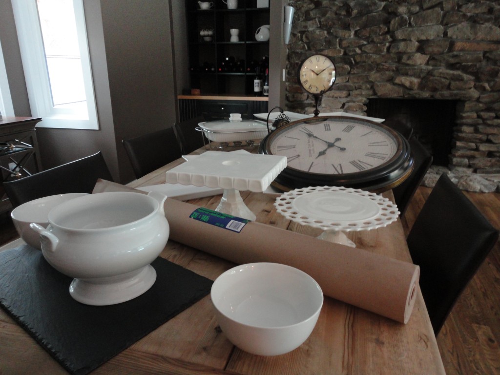 White dishes, rustic table, clocks, slate cheese board, cake plates, pedestal cake plate