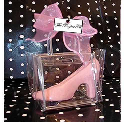 Pink chocolate shoe in a clear vinyl bag for a party favor.