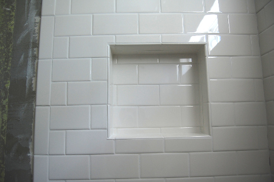 Subway tile in traditional pattern for shower
