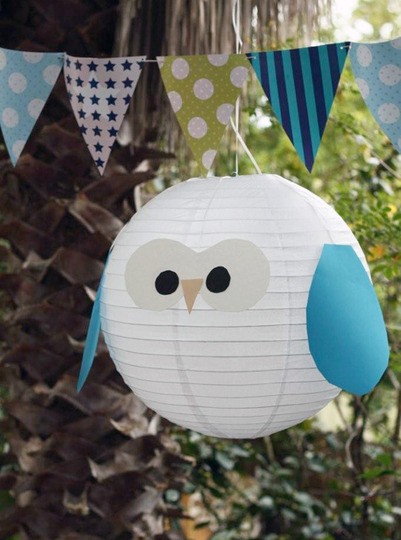 Blue and white owl lantern and banner for an owl-themed party