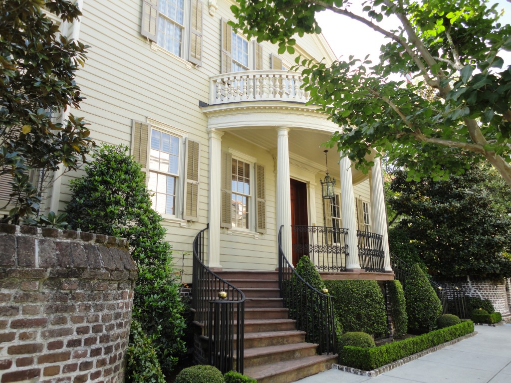 Charleston historic home with a curbed double entrance