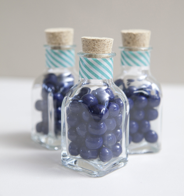 Favor bottles decorated with washi tape
