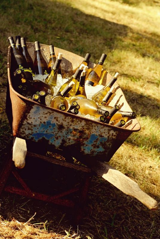 Wheelbarrow filled with ice and beverages