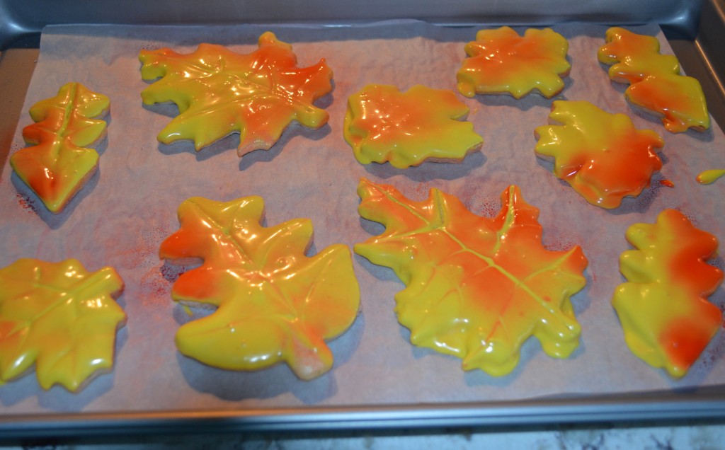 Fall Leaf Cookies drying on a cookie sheet lined with parchment paper