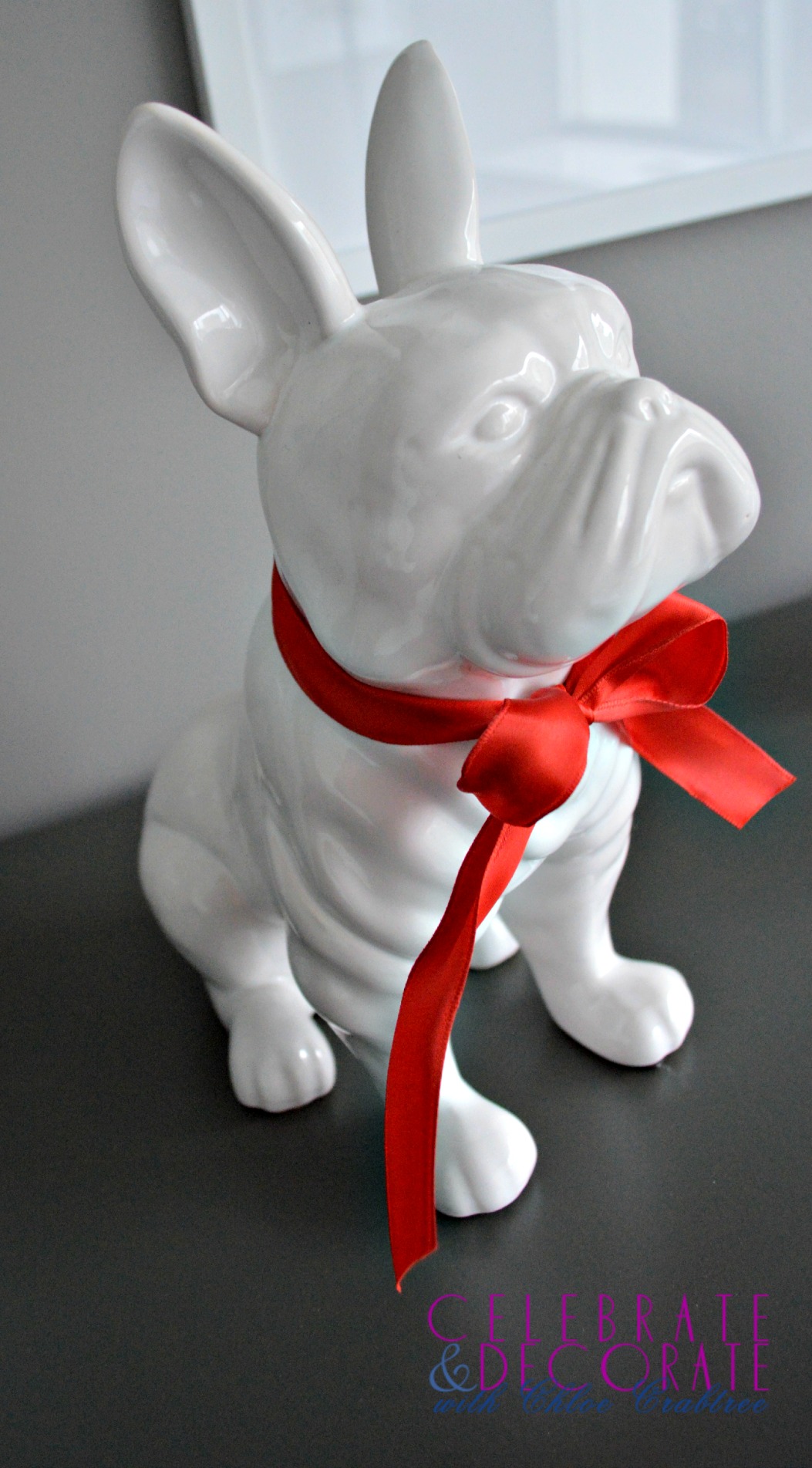 French bulldog with red bow