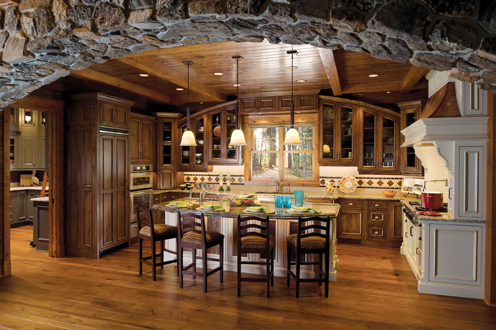 Fine kitchen cabinetry in a rustic home with a beautiful wood ceiling.