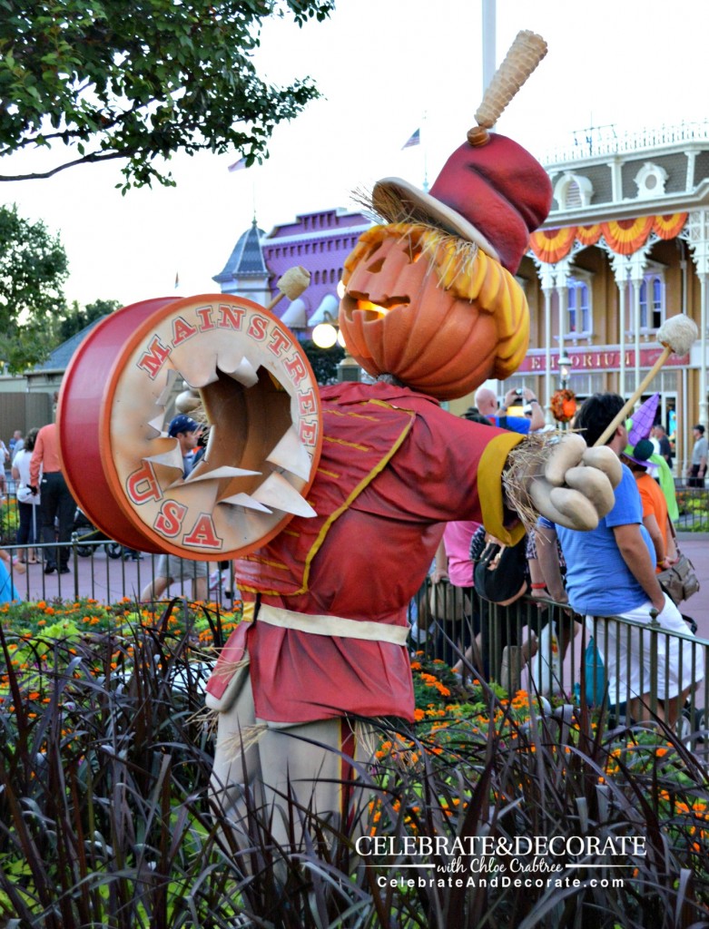 A Band Member Scarecrow greets guests in Town Square