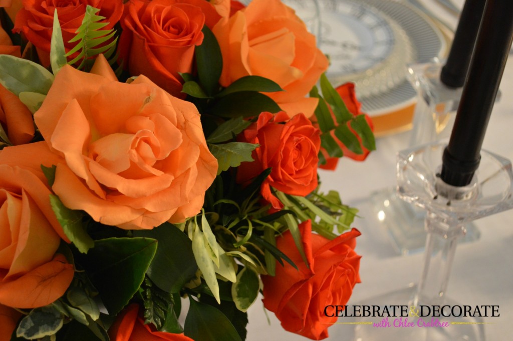 Orange Roses in an elegant centerpiece