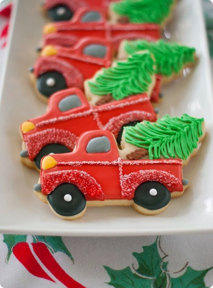 Red truck christmas cookies with a tree in the back