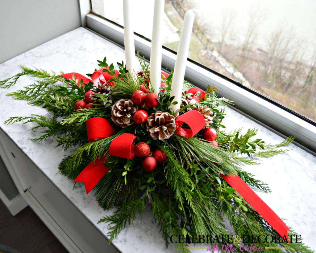 Evergreen and red Christmas Centerpiece with candles