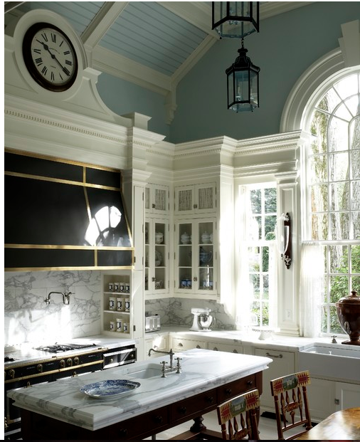 Classic kitchen with amazing windows and beautiful blue ceiling.