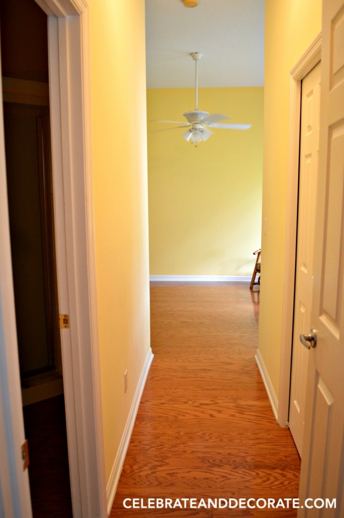 Before picture of hallway into guest room