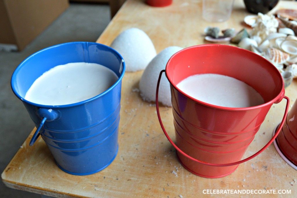Setting up plaster in sand pails