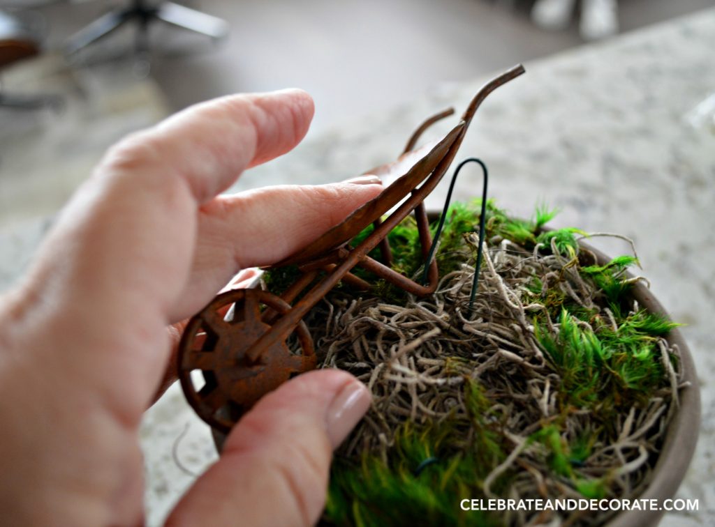 Securing items in a fairy garden