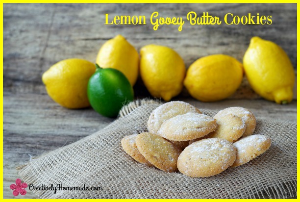 Sweet lemon cookies with lemons and lime in the back