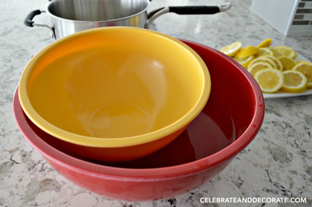 pair of kitchen bowls, yellow and red for making a pretty presentation of shrimp cocktail