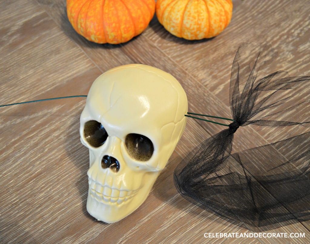 how-to-make-an-easy-dollar-store-skull-garland-for-halloween