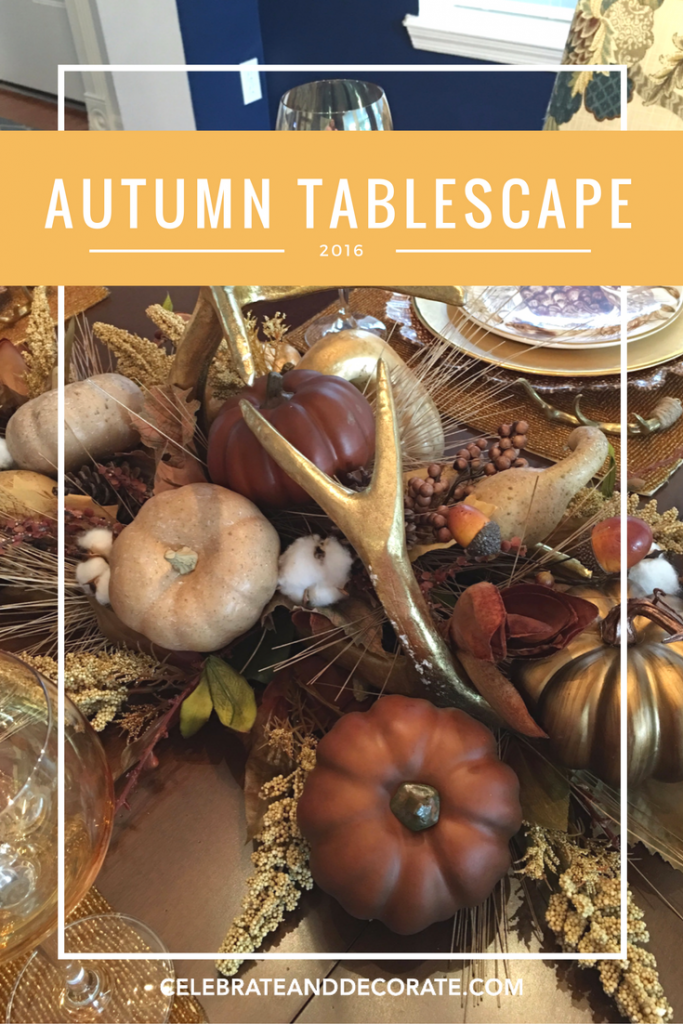 An Autumn Tablescape in browns and golds with golden antlers