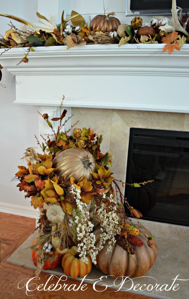 A lavish bushel basket of gourds, leaves and florals rests o the hearth in this lovely Fall display.
