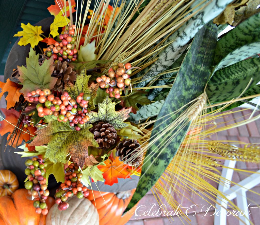 Dress up your plants by adding floral picks and wheat for fall