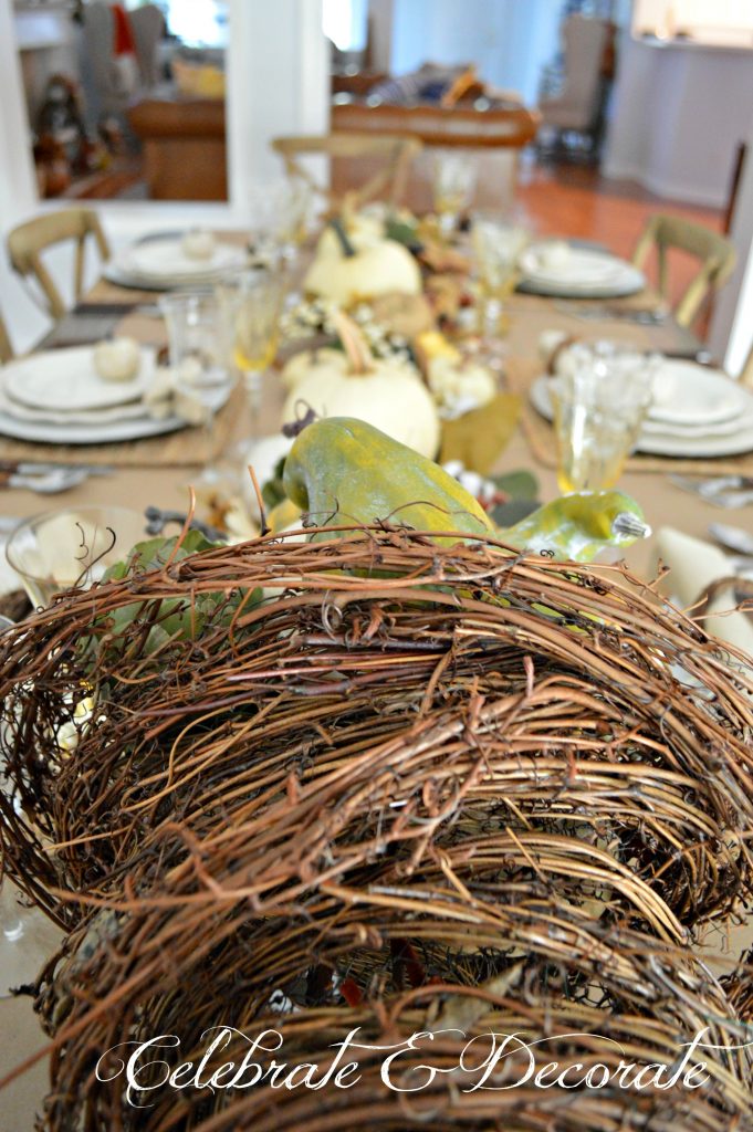 A grapevine cornucopia shares the bounty of the harvest with this Thanksgiving tablescape