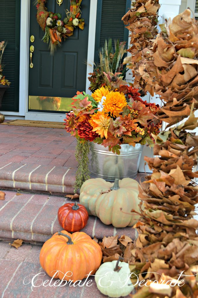 The bounty of the harvest, Fall florals and leaves welcome you to this low country style home