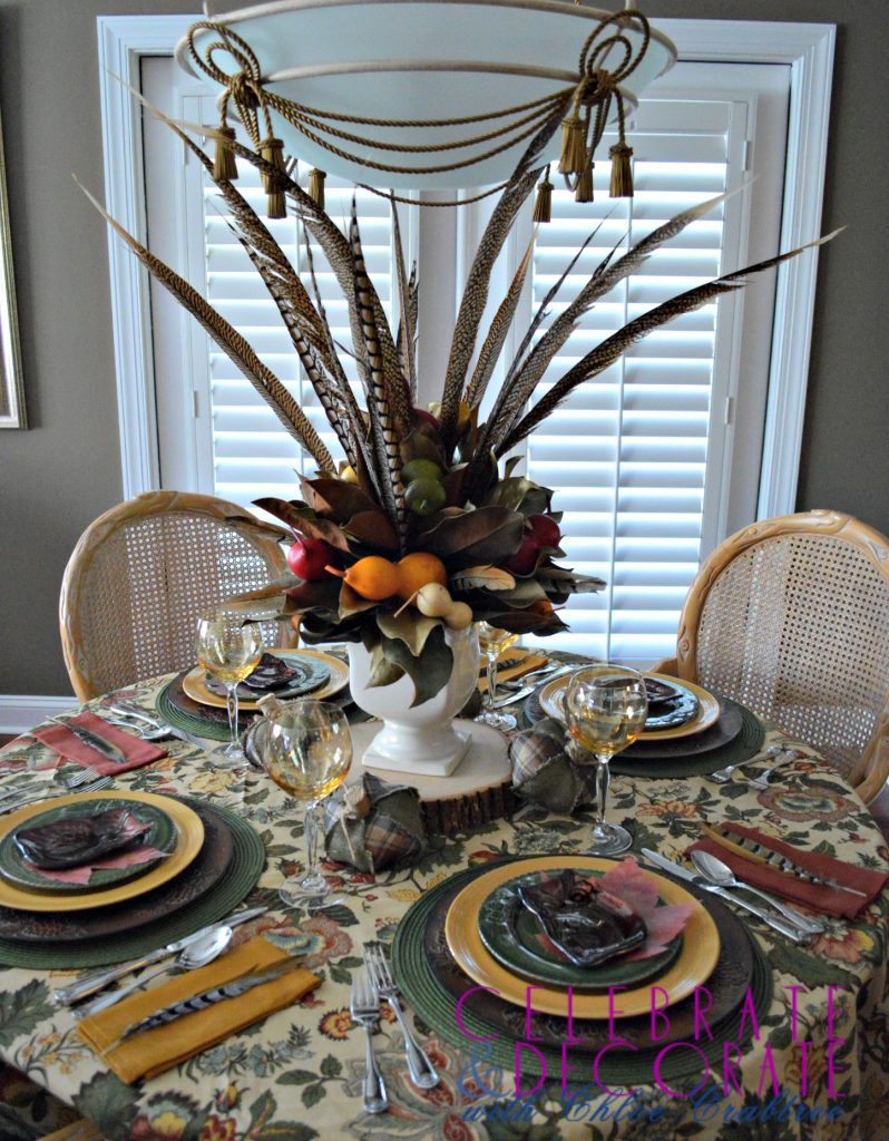 Fall Tablescape with feather and magnolia centerpiece