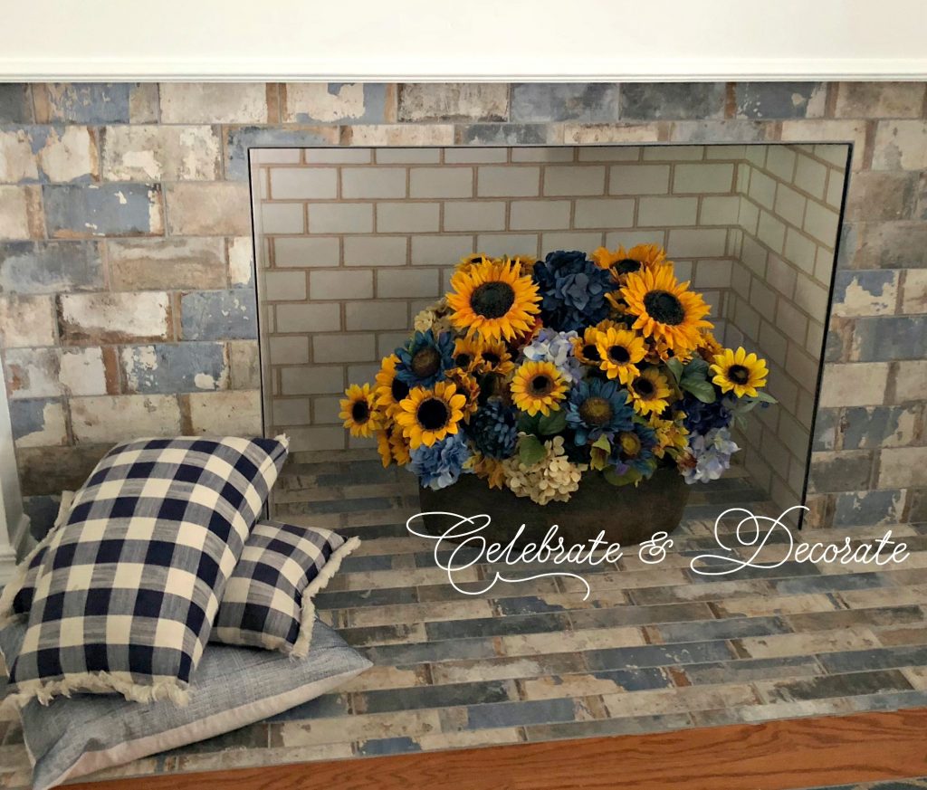 Decorate a fireplace for late summer with sunflowers
