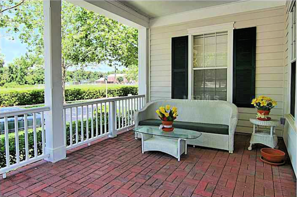 Wicker sofa on the front porch