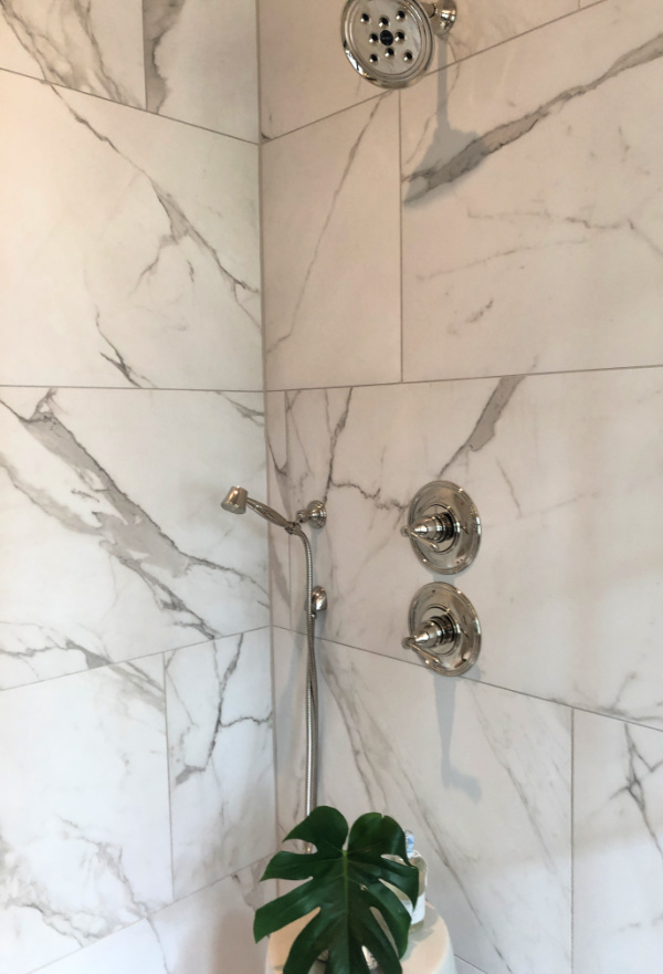 Marble shower with polished nickel fixtures