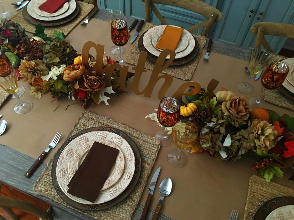 Gather script as a centerpiece for a rustic and casual thanksgiving table