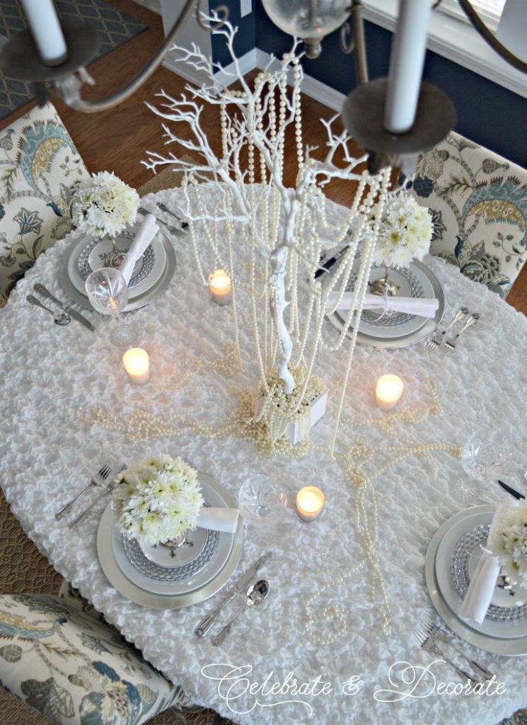 Looking down on a white and silver winter tablescape