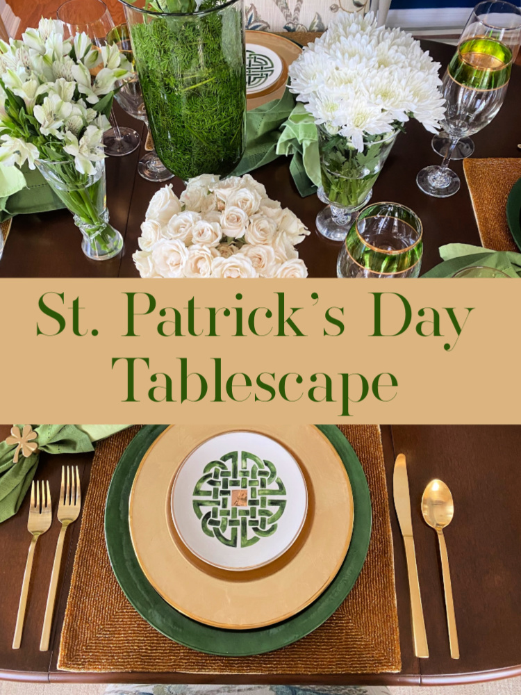 St. Patrick's Day table setting with white flowers and green and gold accents.  