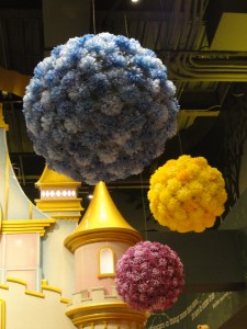 Flowers covering round balls for party decor. These were found in the Disney Store in Times Square.