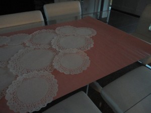 lace doilles, pink and white design of sweets table