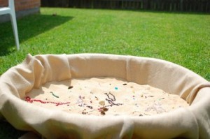 Pirate treasure hunt in the sand at a Pirate themed birthday party