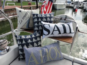Pictures of comfy pillows on the back of the sailboat.
