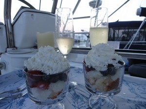 Strawberry and blueberry shortcakes with champagne on a boat!