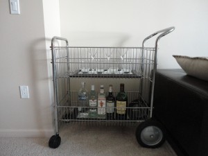 Office mail cart turned into a bar cart in our little apartment