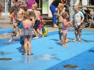 splash zone, summer water fun, kids playing in the water, pool alternative