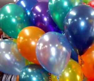 colorful helium inflated balloons for a birthday celebration