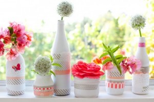 Washi tape vases for a creative centerpiece down a party table