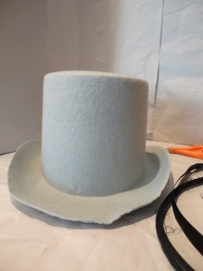 Gray costume top hat with all trim removed