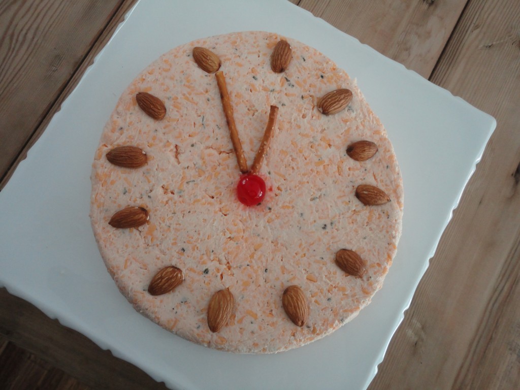 Cheese sculpted into a clock face