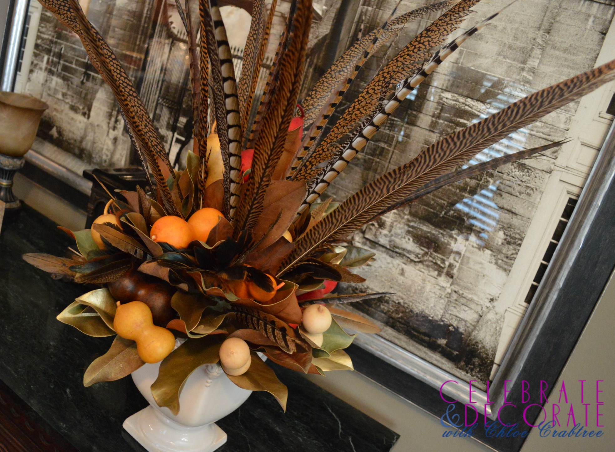 A Fall Centerpiece of Magnolia Leaves and Feathers
