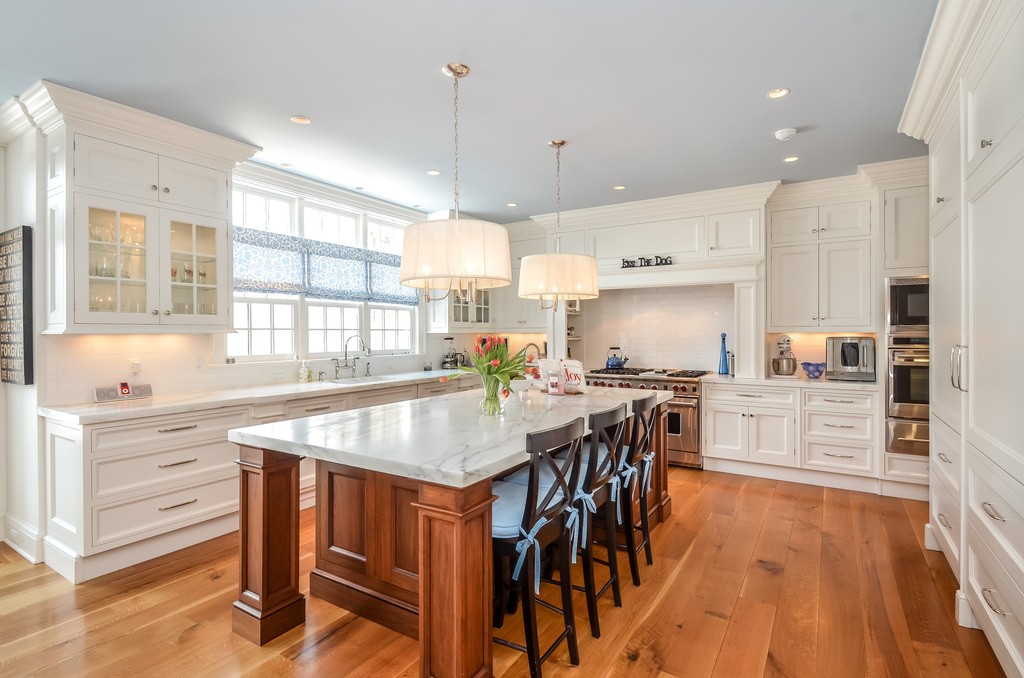 Stunning Middlesex Kitchen with white cabinets and a beautiful island.