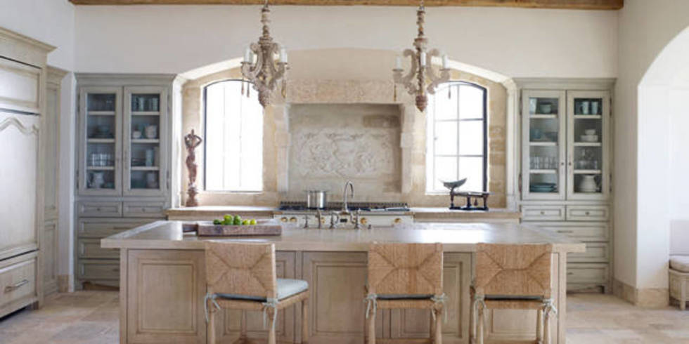 Weathered stone and cabinets in a kitchen.