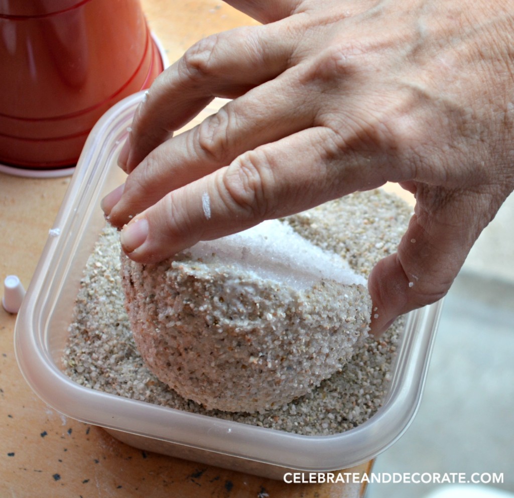 Coating the styrofoam with sand