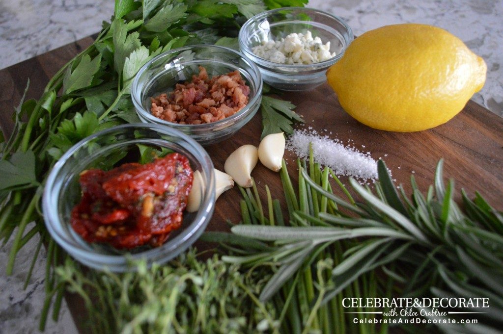 Herbs and seasonings and a lemon on a cutting board