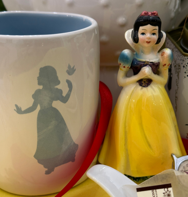 Rae Dunn snow white coffee mug and a 1960 Snow White figurine